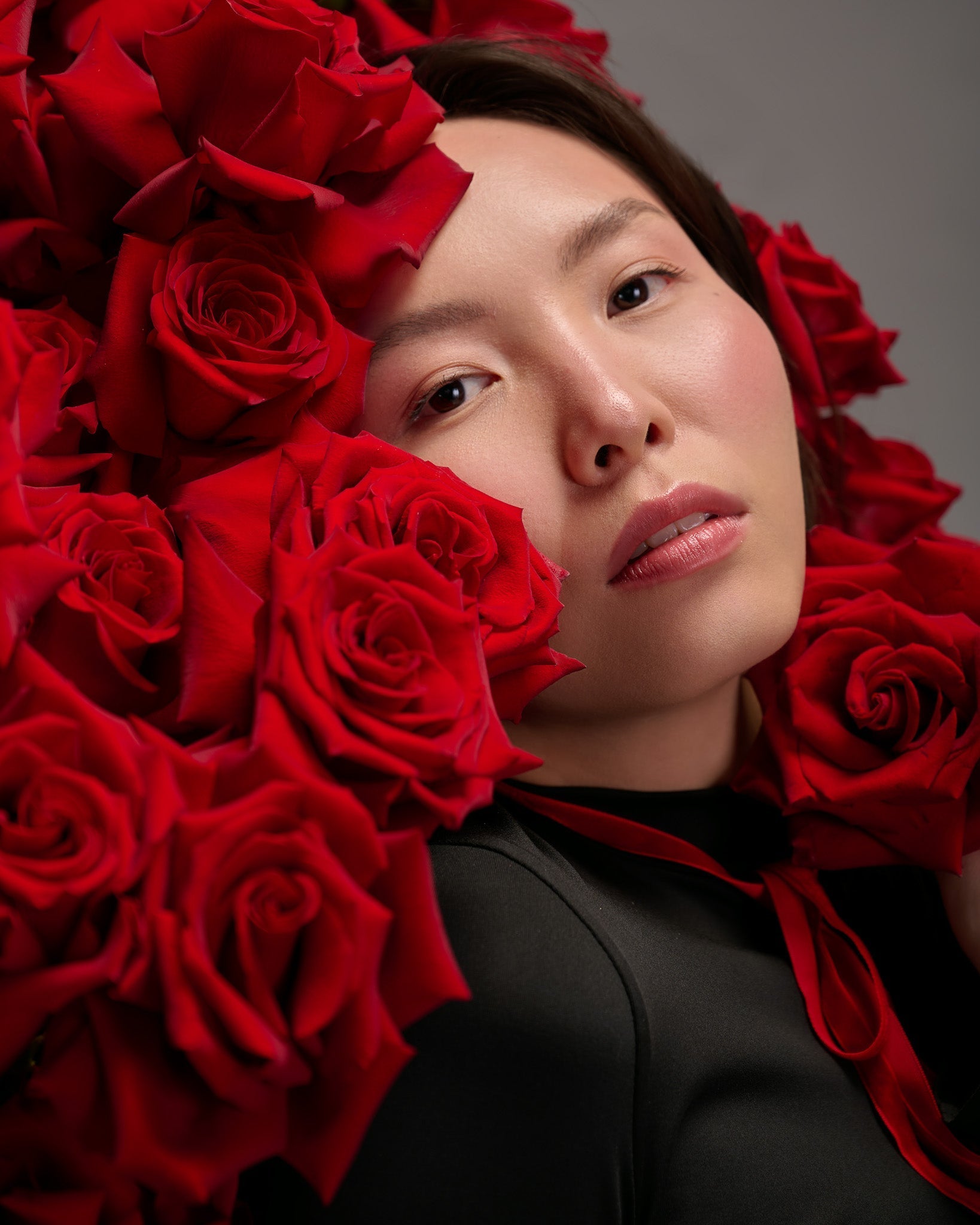 Woman in Red Roses