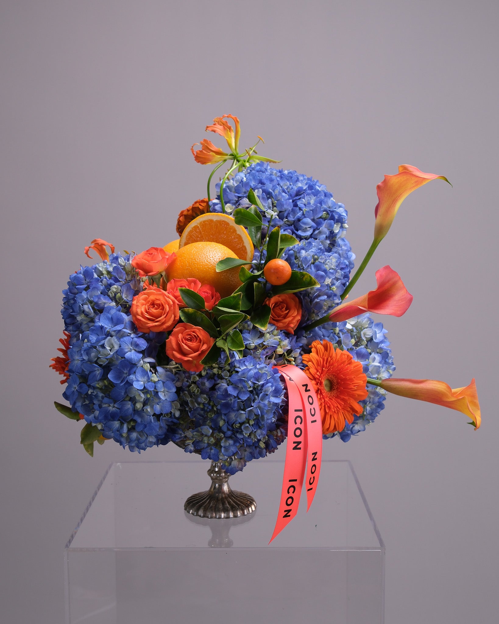 Aperitivo — Signature Blue Hydrangea & Orange Arrangement