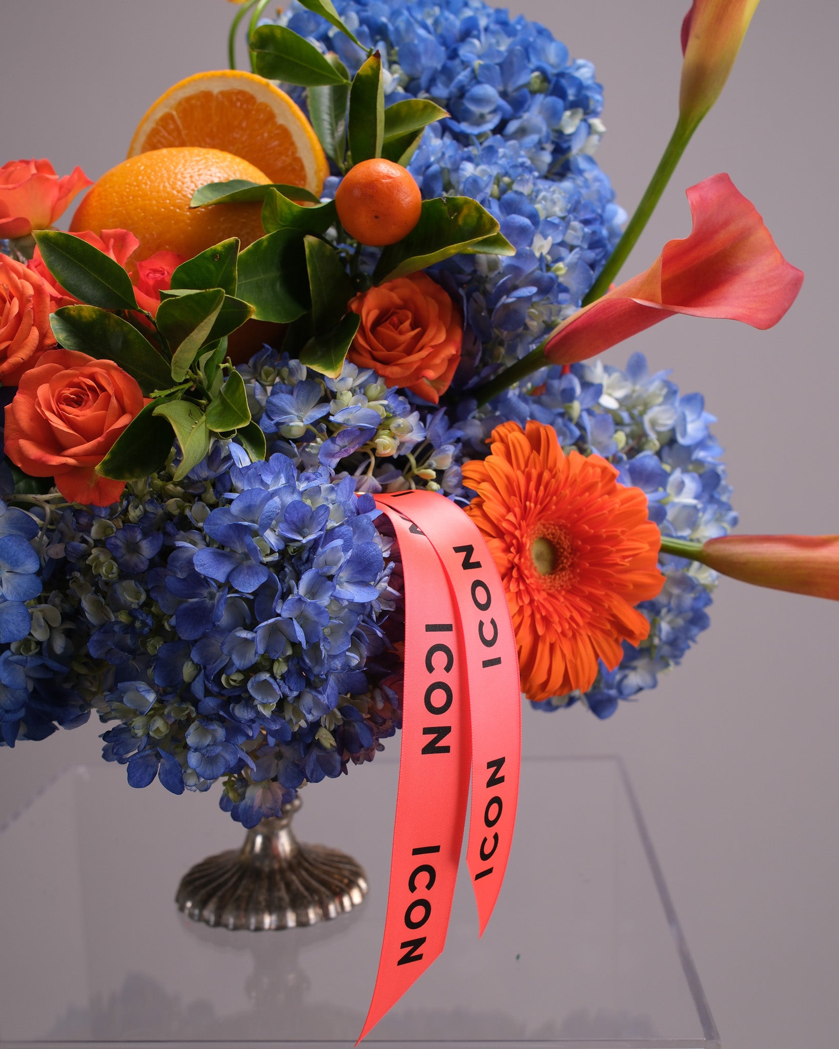 Aperitivo — Signature Blue Hydrangea & Orange Arrangement